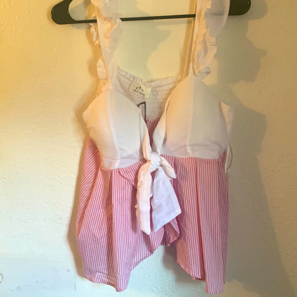 Large red and white top. New with tags.